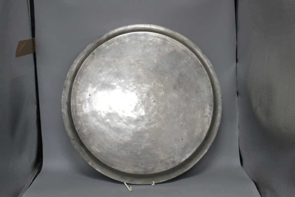 A Cairoware brass inset pewter tray, diameter 54cm